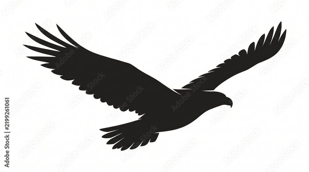 Obraz premium Silhouette of a Soaring Eagle: A powerful eagle in mid-flight, its wings outstretched against a clean background, embodies freedom and majestic flight.