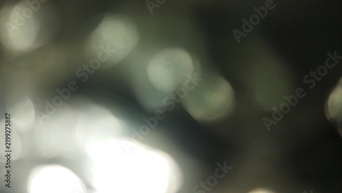 Abstract Blurry Silver Bokeh Lights Defocused Glimmer Texture Background