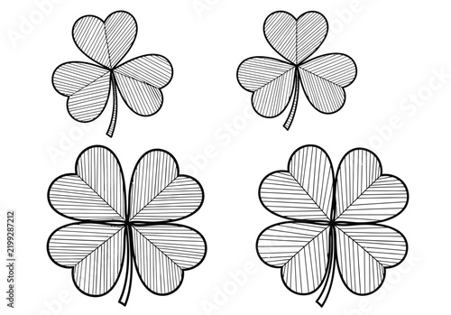 Fotografie Collection of four shamrock and four-leaf clover illustrations, each featuring striped patterns, perfect for holiday and luck designs