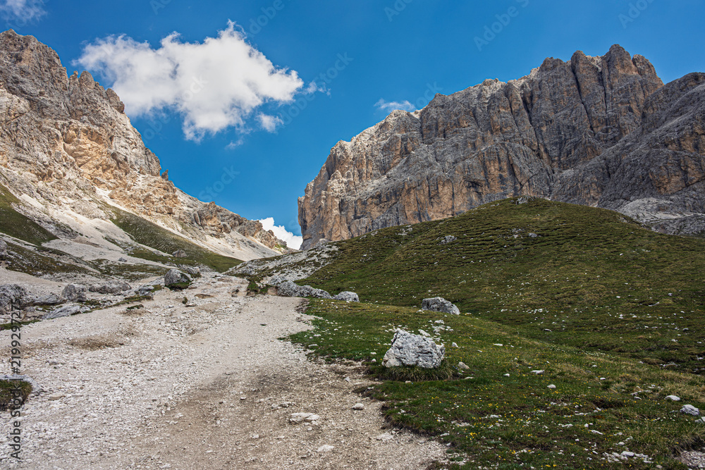 Fototapeta premium mountain landscape inside the Catinaccio Mountain Range along the trail to get to the Lake Antermoia, Val di Fassa, Dolomites, Italy