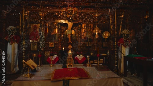 The richly decorated interior of an Orthodox church in Kissos village, Pelion, Thessaly, Greece. An elaborate iconostasis