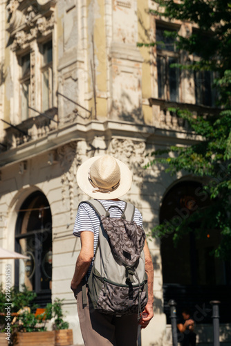 Photography elderly tourist woman looking at old town architecture in Bratislava Slovakia la