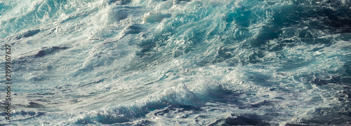Принти на полотні Turbulent Turquoise Ocean Water with Swirling Sea Foam