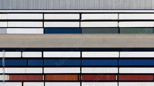 Aerial View of Orderly Warehouse Yard with Trucks and Loading Area