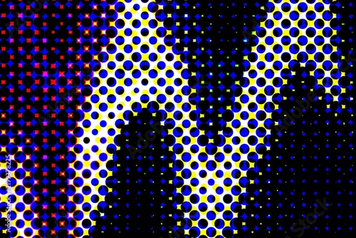 Abstract halftone pattern with vibrant blue yellow and red dots creating a dynamic wave effect