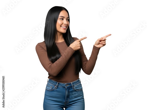 Smiling young woman with long dark hair pointing to the side with fingers