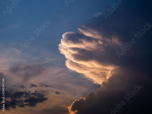 Unusually shaped clouds at sunset