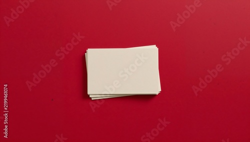 Stack of Blank Cards on Red Surface for Various Uses