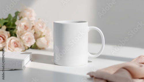 Coffee Mug on a Table With Flowers and Soft Fabric in a Bright Room