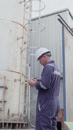 Engineering work taking note report check maintenance Exhaust system concept Clean air environmental protection.Factory industrial manufacturing. Sustainable future environment air pollution reduction