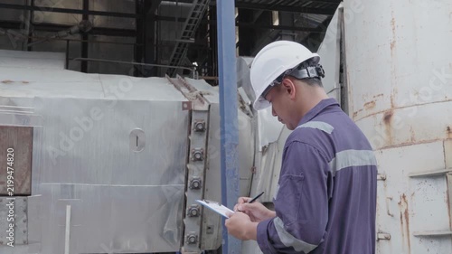 Engineering work taking note report check maintenance Exhaust system concept Clean air environmental protection.Factory industrial manufacturing. Sustainable future environment air pollution reduction
