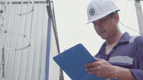 Engineering work taking note report check maintenance Exhaust system concept Clean air environmental protection.Factory industrial manufacturing. Sustainable future environment air pollution reduction