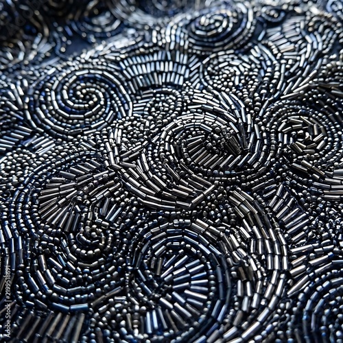 Intricate Metallic Beaded Spiral Texture