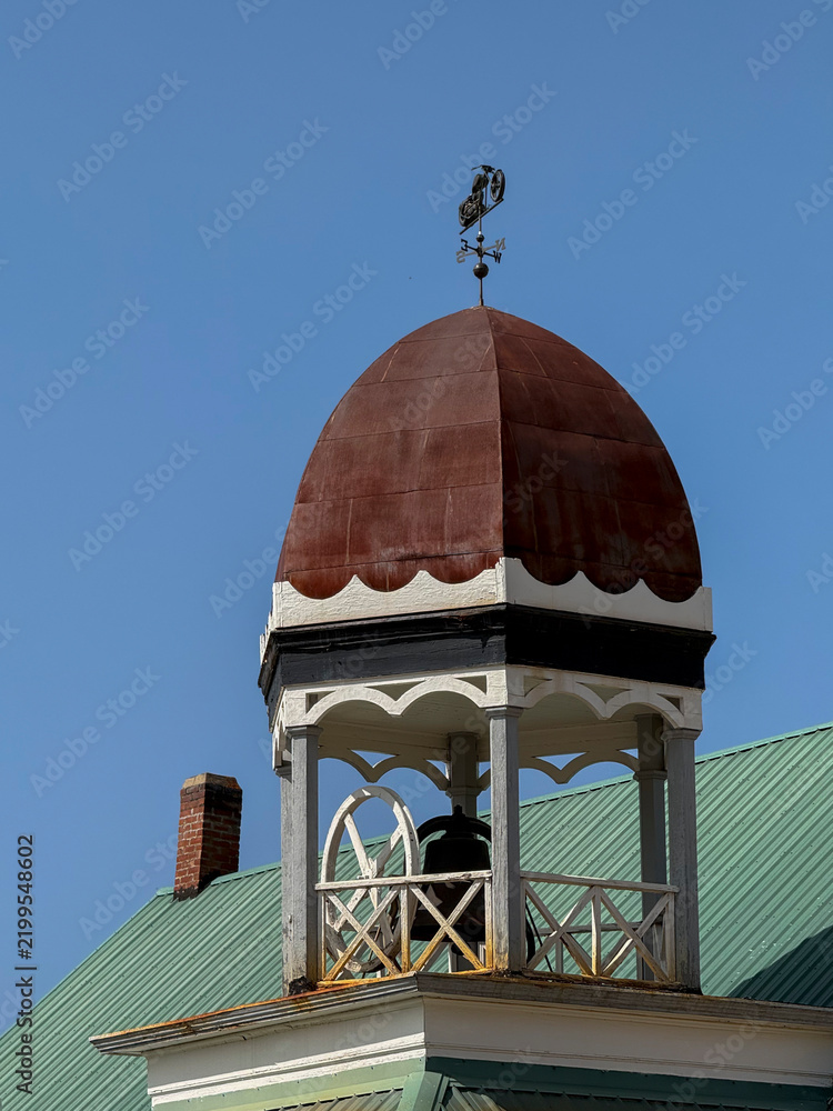 Fototapeta premium A bell tower on a historic church in Philipsburg, Montana