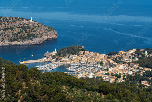 Elevated view of Port de Soller harbor with marina, boats and Mediterranean coast in Mallorca, Spain