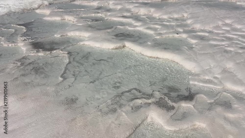 Stunning white travertines with thermal spring water in Pamukkale, Türkiye.