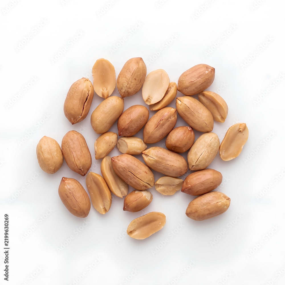 Obraz premium Raw Unshelled Peanuts on White Background for Cooking and Snacks.