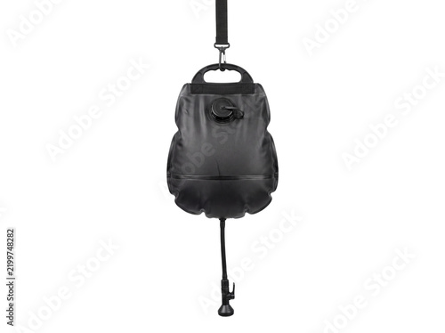 Black inflatable buoyancy control device with valve and hose hangs on transparent background buoyancy-control bcd