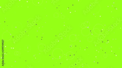 Abstract animation of white and grey circles floating over a bright lime green background.