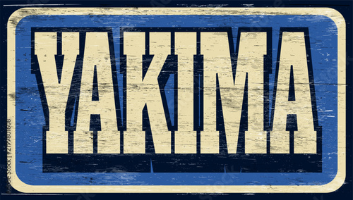 Aged vintage Yakima sign on wood