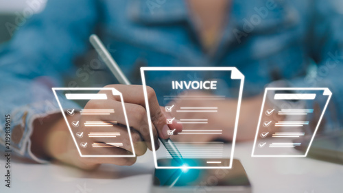 Accountant using stylus pen signing electronic invoice on smartphone with virtual paperless bill icons for digital tax payment accounting financial management and transaction proof in office.
