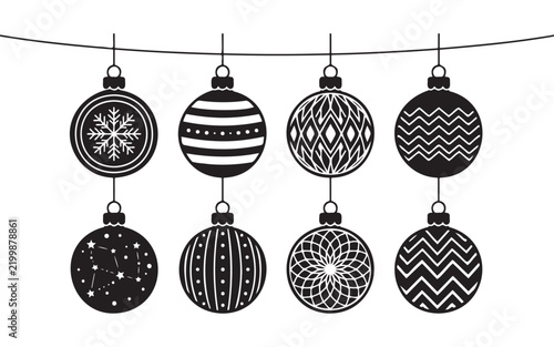 Set of eight christmas baubles hanging on a string line with hanging ornaments