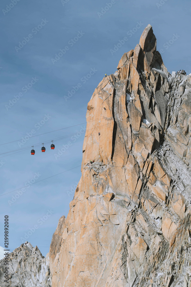 Fototapeta premium Cable car line passing through Chamonix Alps in France