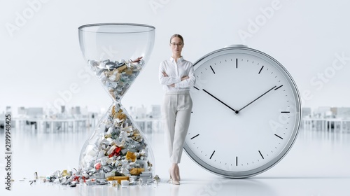A woman stands confidently next to a large clock and an hourglass filled with various objects, symbolizing time management and efficiency in a business context
