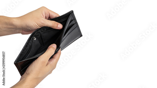 Human hands holding empty open old black leather wallet isolated on transparent background.