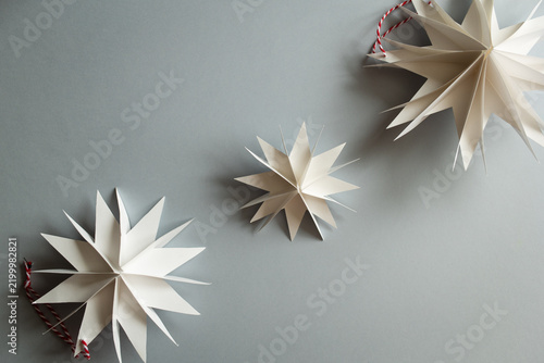 DIY gift handmade Christmas tree decorations: toy snowflakes star. paper craft for kids. create art for children. step by step