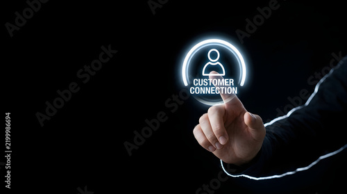 Business professional touching digital customer connection interface glowing