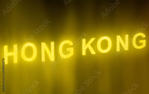 Fotografie Neon style sign reading Hong Kong, yellow on black background