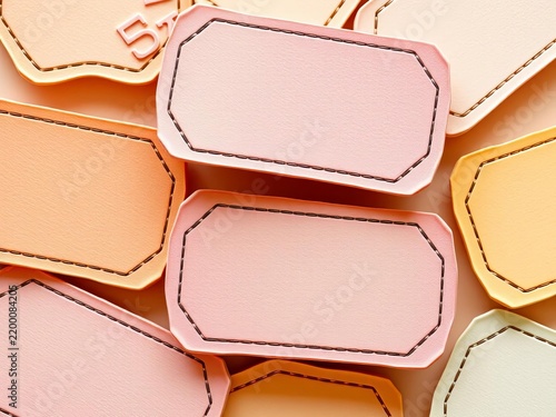 Textured paper labels with raised patterns and soft colors, design, textured