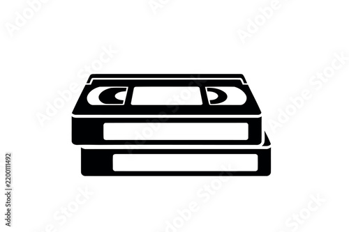Stack of two classic VHS video cassette tapes in black and white.