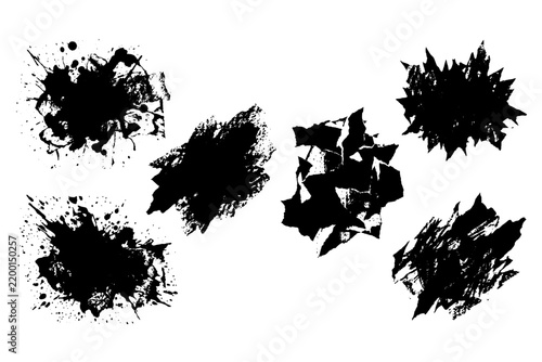 Set of varied abstract grunge paint strokes and shattered shapes