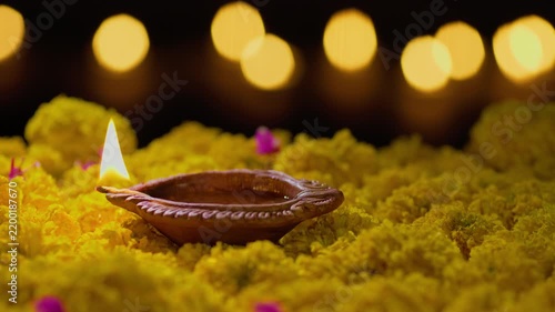Clay diya lamps lit during diwali celebration, Diwali, or Deepavali, is India's biggest and most important holiday.