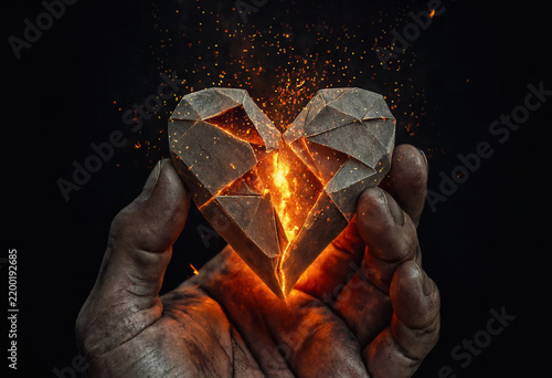 Closeup weathered hand holds a cracked geometric origami heart glowing with fierce inner fire and flying sparks. Hot embers burst from the core, symbolizing passion and burning emotions