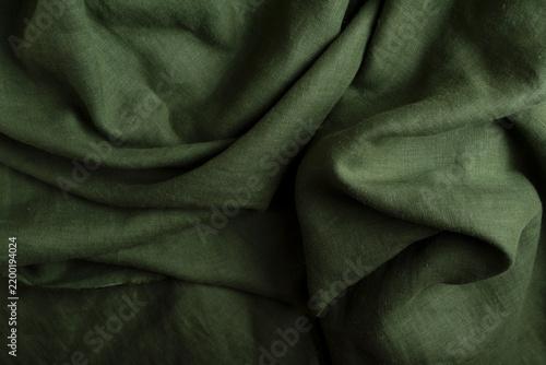 Crumpled Olive Green Linen Fabric Background