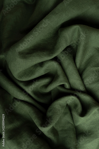 Crumpled Olive Green Linen Fabric Background