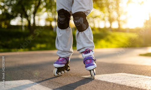 Obraz na płótnie Child Rollerblading At Sunset