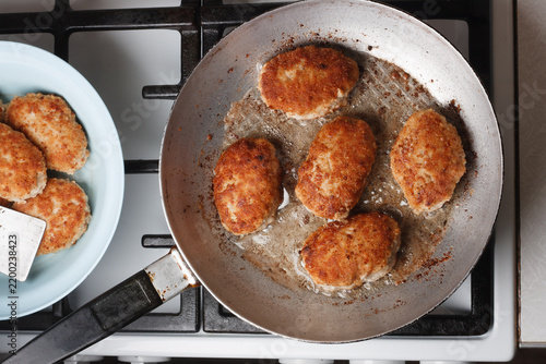 Canvastavla Minced pork cutlets coated in breadcrumbs are fried in lard in frying pan