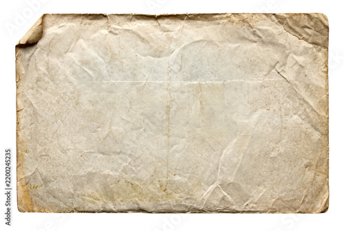 Aged and Weathered Parchment Paper with Frayed Edges and Curled Corner