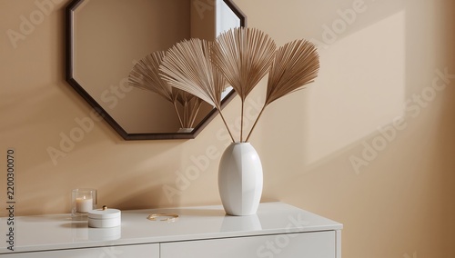 Decorative Vase With Dried Plants on a White Table Next to a Mirror in a Ligh...