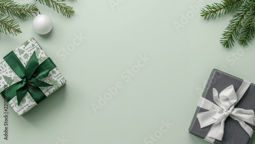 Holiday Gifts and Decorations on a Light Green Background