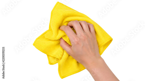 A hand holding cleaning yellow towel isolated on transparent background