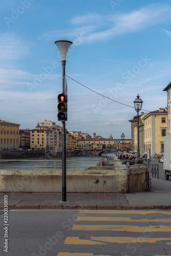 Canvastavla Pedestrian Traffic Light Overlooking the Historic Ponte Vecchio Bridge in Sunny