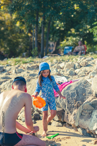 Father and Daughter Enjoying Quality Time Playing Together on the Beach