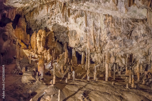 stalagmites below draperies on ceiling at Postojna cave, Slovenia
