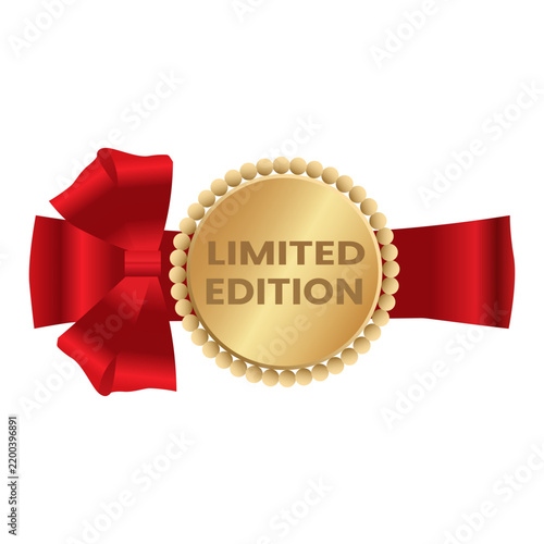 Golden medal with red bow and ribbon