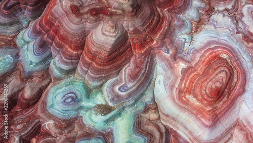 Aerial view of colorful mineral evaporation ponds in the Utah desert